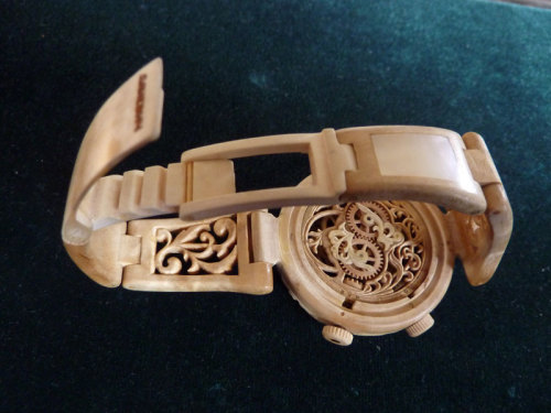 A functional watch carved entirely from wood other than one sole metal spring. Ukrainian creator Valerii Danevych used to made wood artworks until he moved onto mechanics, see more here