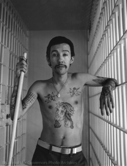 pogphotoarchives:  Tattooed man in prisonPhotographer: Douglas Kent HallDate: 1980sFrom HP.2015.68