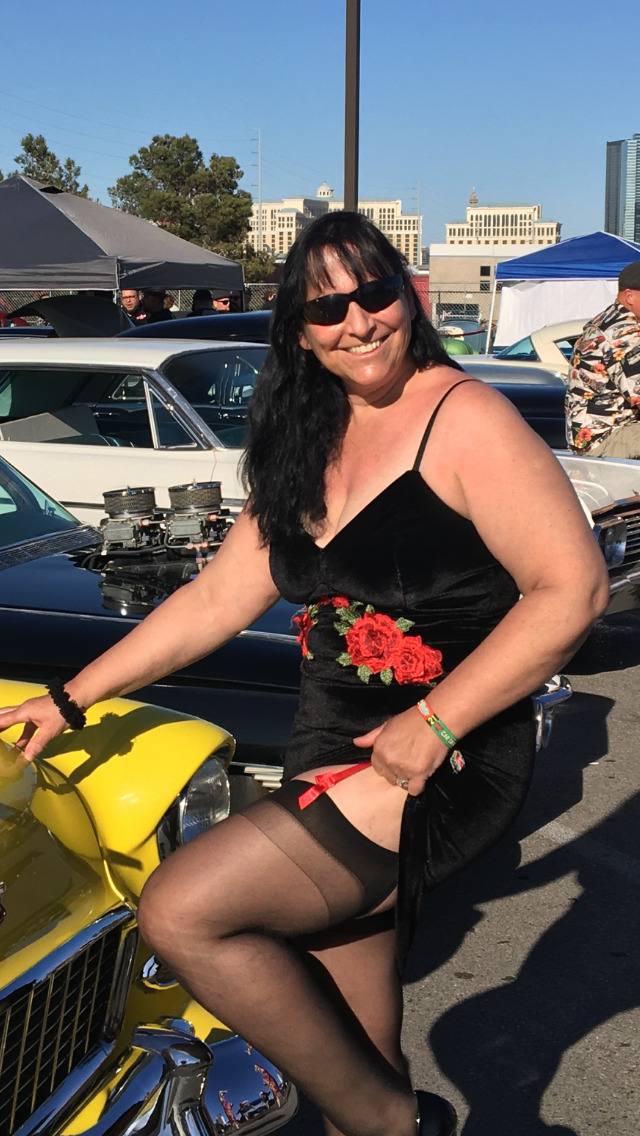 At the Rockabilly car show at the Orleans. She was posing for her husband or boyfriend