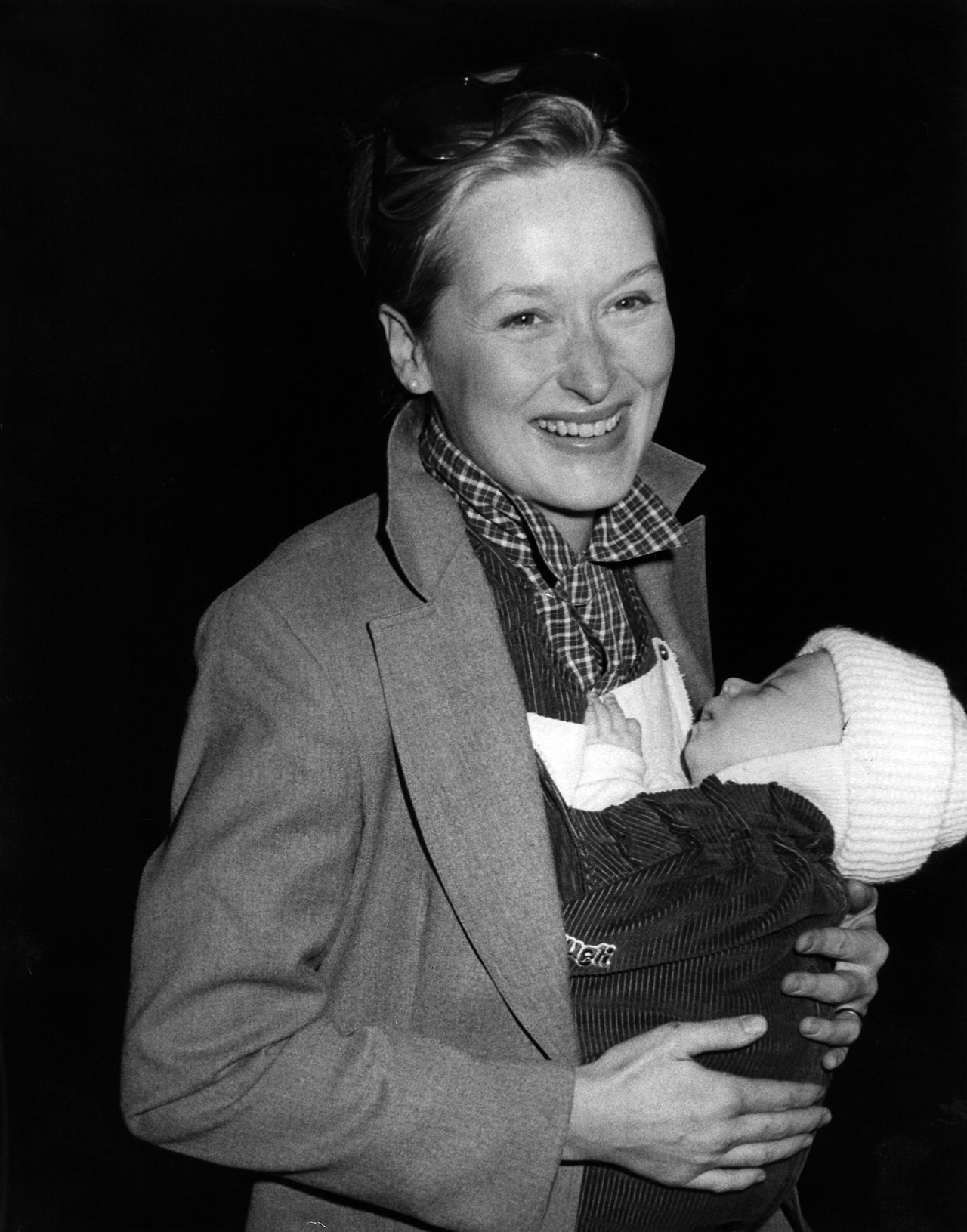CR Fashion Book — Meryl Streep with her son Henry at JFK airport in...