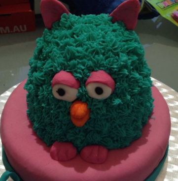 arcadefurbz:  turings:  turings: raw emotion captured through the medium of furby cakes   If u eat 1(one) frosting strand of his fur u will learn ALL the secrets of furby kind. 