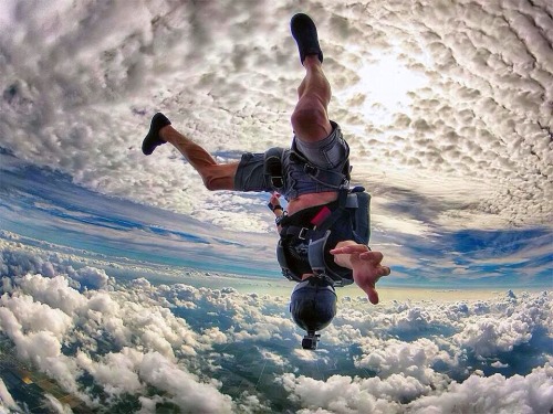 scottthepiper:  One of my favorite pictures. Not sure who it is or where it was taken or who took it but it is awesome. Found out who took the picture! This is Dexter Marcelino and the picture was taken by Ralph Turner over Skydive Miami. 