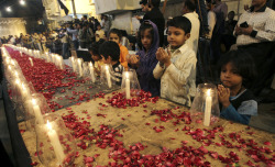 skelepeach:  Children recite prayers for those who were lost during the Peshawar attacks. 