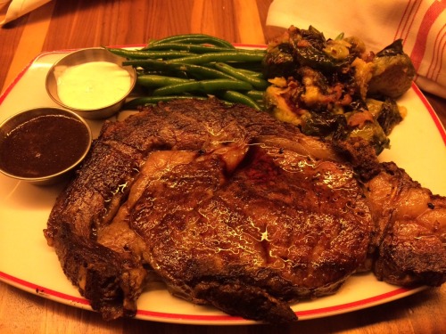 20 ounce grass fed prime rib with brussels sprouts, green beans and delicious gravy.
