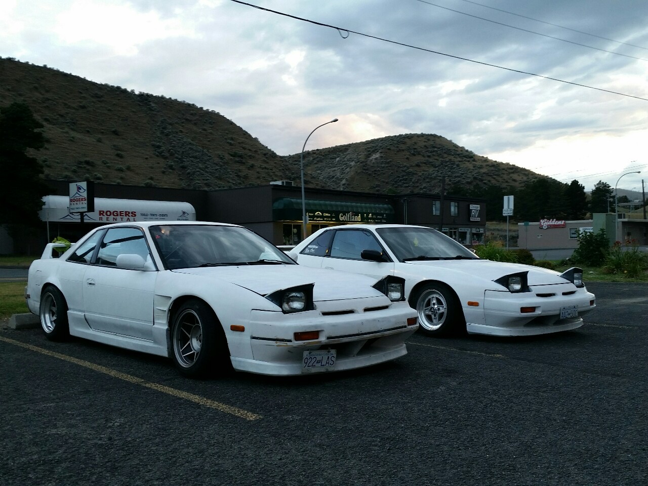 thislifeintransit:  couple bone heads with trashy white cars
