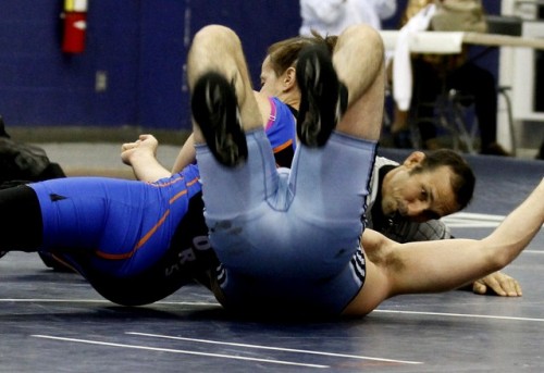 Male wrestler defeated by a female wrestler