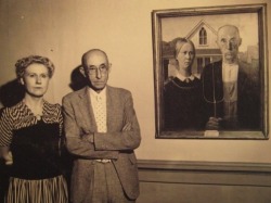 museoleum:  The models who were used in “American Gothic” standing by the painting by Grant Wood 