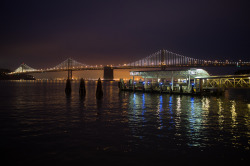 jslieberman:  Bay Bridge, San FranciscoFuji x100Shutter Speed: 1/9 sAperture: f/2ISO/Film:  3200