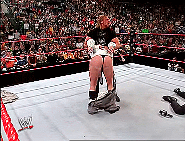 Vince McMahon pedigreed by Triple H.