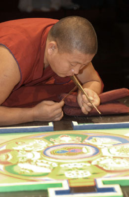 freersackler:  In response to the September 11 tragedies, twenty Buddhist monks from the Drepung Loseling Monastery constructed a sand mandala (sacred painting) at the Sackler in 2002. This seven-foot-square mandala, one of the largest ever created in