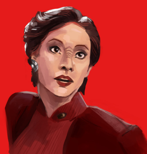 cipher-fresh: [ID: Art of Kira Nerys looking near the camera on a red background /End ID]