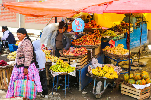 Cholita at Fruit Stand: Quillacollo, Bolivia - 2015