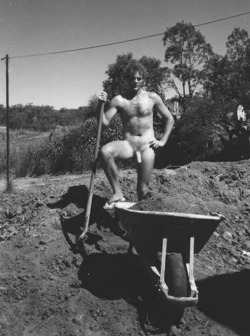 vintagemusclemen:  Shoveling dirt into a