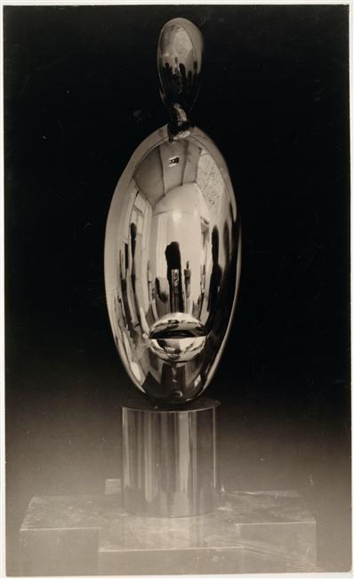 Photograph taken by Brancusi of his own work - La Négresse Blonde, with view of polished bronze face