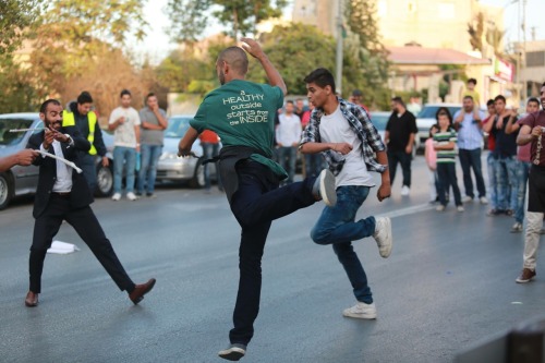 frompalestinewithlove:Palestinians celebrate Eid with a Debkeh flash mob Eid Mubarak from Ramallah!