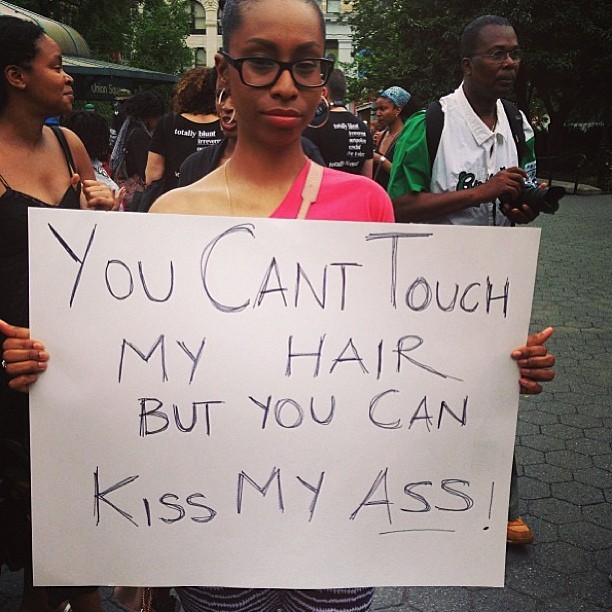 gardeniasandgoldchains:  [A photo of a Black woman holding a sign which reads, “You
