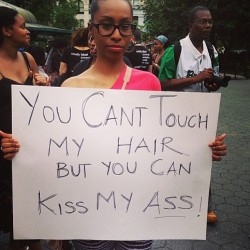 gardeniasandgoldchains:  [A photo of a Black woman holding a sign which reads, “You can’t touch my hair, but you can kiss my ass.”] 