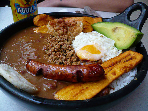 cravingsatmidnight: Colombian National Dish - Bandeja Paisa. Red beans cooked with pork, white rice,