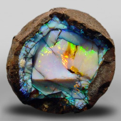 sixpenceee:  An Ethiopian opal geode. 