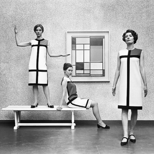 bauhaus-movement:  Yves Saint Laurent’s De Stijl collection in front of a Piet Mondrian compos