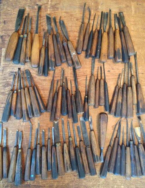 Collection of antique woodworking tools.