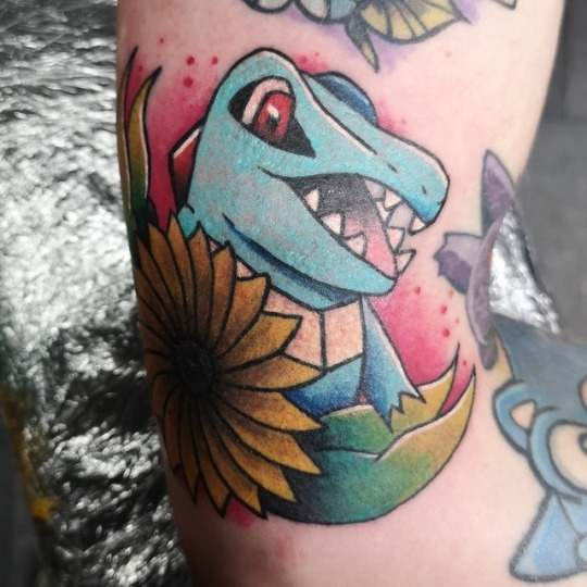 kiimon-art:  Did this Totodile tattoo yesterday! Blue is so hard to saturate ! 