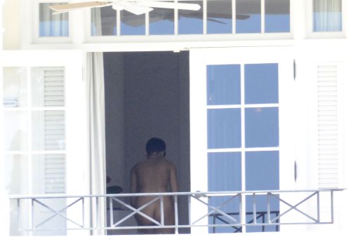 Rihanna caught naked while changing bikinis.