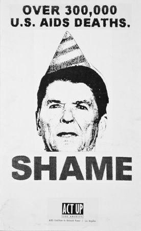 poster reading "over 300,000 U.S. AIDS deaths. SHAME" with an image of ronald reagan wearing a striped pointy hat. ACT UP logo.