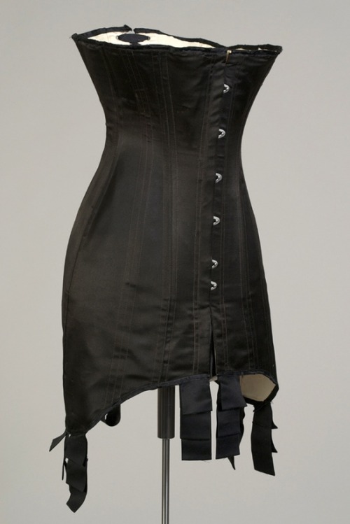 shapingcontours:  Corset. American, ca. 1910. Black silk with steel boning. (via Undress: Shaping Fa