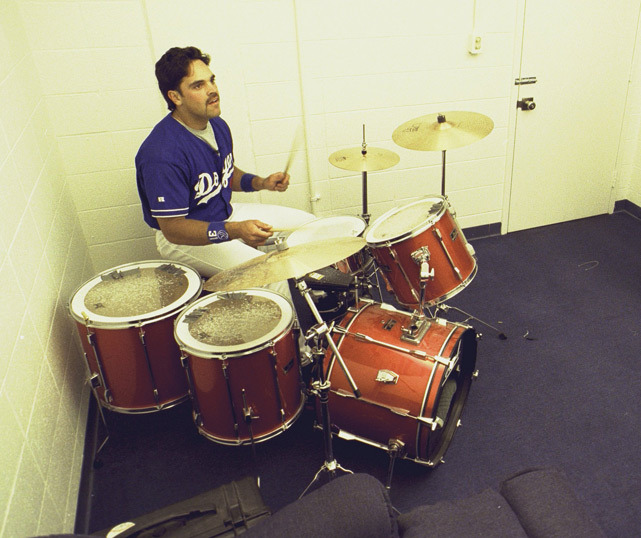 siphotos:  Mike Piazza plays the drums in the basement of Dodger Stadium in May 1998.