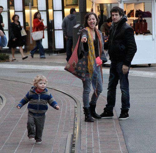 This photo wherein Marion Cotillard laughs at Le Petit Prince her son, Marcel, who’s wandered away while his parents were making out is my favorite thing today.
BY FAR.