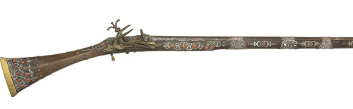 Silver, brass, and coral mounted miquelet musket originating from North Africa, early 19th century.