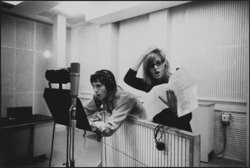 Terrence Stamp and Monica Vitti   recording music for &lsquo;Modesty Blaise&rsquo;. 1965