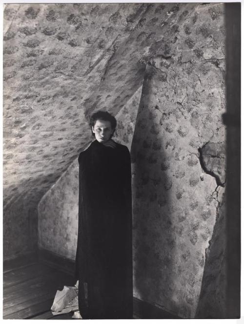 killerbeesting:Clarence John Laughlin, Shrouded Woman against a Plaster Wall