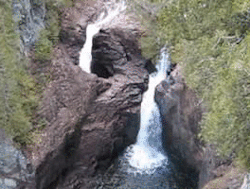 sixpenceee:  1-800-fyou:  sixpenceee:  THE MYSTERY OF DEVIL’S KETTLE FALLS Look at the 2 waterfalls. One of them (the one to the left) seems to descend into a hole and disappear forever. Researchers have poured blue dye and ping ping balls into the