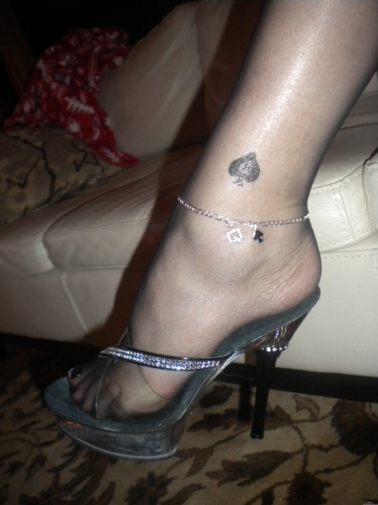 postyourslut:  Black Mini Dress, Black Nylons, a Queen of Spades Tattoo and Anklet. 