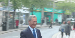 kropotkindersurprise:  May 1 2014 - Nigel Farage, leader of the racist UK Independence Party gets egged. The man who threw the egg was holding a placard which said: “UKIP… sad, scared, old men”. He was put into a patrol car by police and driven