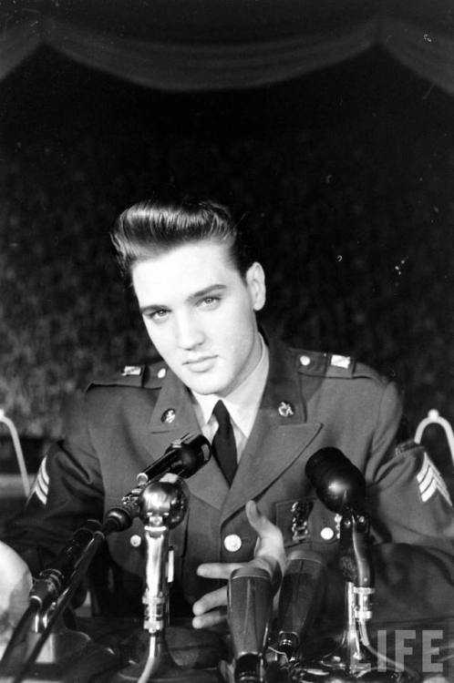 Elvis holds a press conference as he is discharged from the Army(James Whitmore. 1960?)