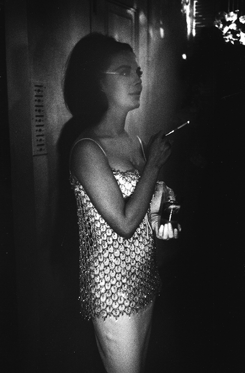 missavagardner: Natalie Wood at a party, photographed by Bob Willoughby, 1964.