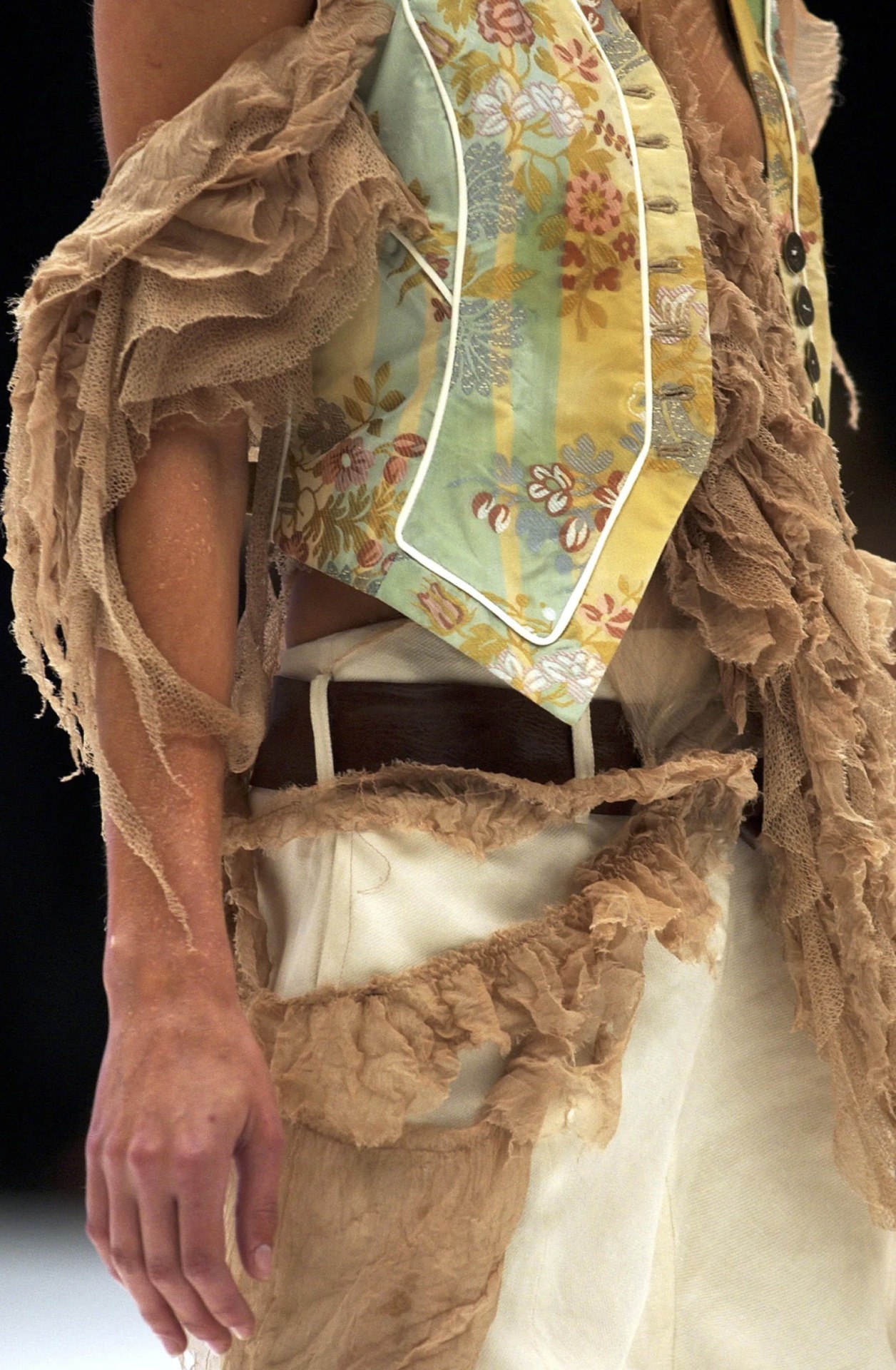 Pirate fashion from Alexander McQueen Spring 2003 RTW #pirates#pirate fashion#alexander mcqueen#runway details#pirate looks#lee mcqueen#2000s#y2k runway#y2k fashion#ss03 #spring 2003 rtw  #I was doing research for Pirates of the Caribbean t-shirts at work and looked up what the fashion world was doing the same year  #I refuse to use the word fit or the suffix core so I am not tagging with those things no matter how trendy they are  #yes yes I am very annoying