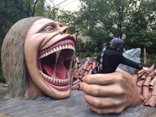 leviskinnyjeans:A look at a statue of the Smiling Titan at Universal Studios Japan!SourceWhy doesn&r