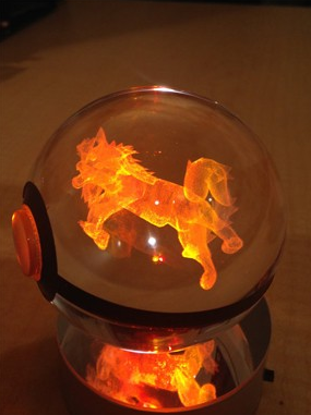 sixpenceee:These crystal Poke Balls hold a 3D etched pokemon inside them that glows with the LED lig