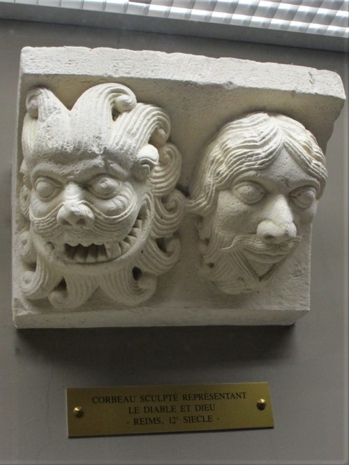 The Devil and God, 12th century, Reims Photo by Charles Reeza at the Musée Saint-Remi, Reims The dev