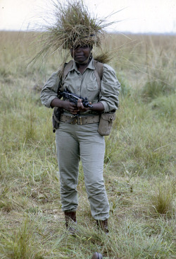 humanoidhistory:  A female paratrooper training near Kinshasa in the Democratic Republic of Congo, 1970, photo by Eliot Elisofon. (Smithsonian) 