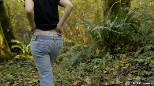 freefetishpics:  Check out the waistband of Sosha’s pullup in this video.Walking through the woods, Sosha is wearing a pullup under her jeans.   The waistband is peaking out, clearly visible.  We follow her,  enjoying the sight of her waistband as