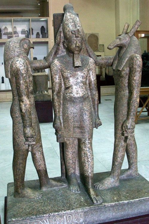 Statue of Ramesses III with Horus and SethThe group represents King Ramesses III, the god Horus and 