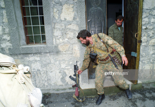 speciesbarocus:Abkhaz militiamen leave the church after attending a prayer service.