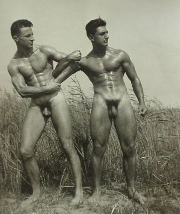 vintagemusclemen:  Two young men entwined in the dune grass at Fire Island, 1940.