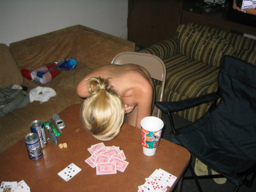 stripgamefan:  Second part of the ‘classic’ Strip Poker set: she loses the tank top (gets topless), and right at the end strips off her little thong and gets completely nude.  The photos to come continue with her still fully nude.