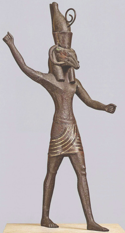 Statuette of Seth-AmunSolid cast bronze with gold and silver overlay.Set, God of the desert, storms,